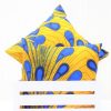 Two yellow African print cushions