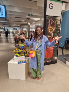 Founder Kala Paul-Worika with By Kala X products in John Lewis Stratford