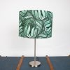 green by kala x lampshade on a silver lamp stand