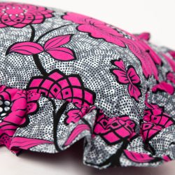 Rectangle ruffle cushion in a pink and grey fabric