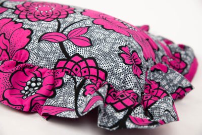 Rectangle ruffle cushion in a pink and grey fabric